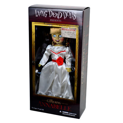 Living Dead Dolls Annabelle doll in packaging with a white dress and red rose.